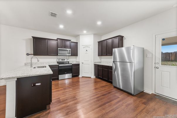Interior, Kitchen, Recessed Lighting, Stainless Steel Appliances, Wood Texture Flooring