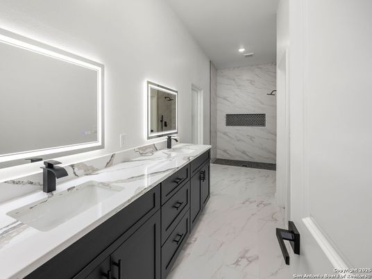 Bathroom, Dual Sink Vanities, Interior, Marble, Marble Walls, Recessed Lighting