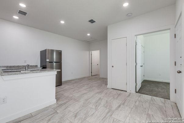 Empty room, Interior, Kitchen, Marble, Recessed Lighting, Stainless Steel Appliances