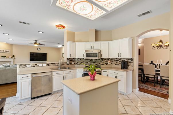 Chandelier, Dining room, Interior, Kitchen, Recessed Lighting, Stainless Steel Appliances