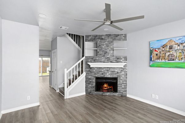 Fireplace, Interior, Recessed Lighting, Stone Walls, Wood Texture Flooring