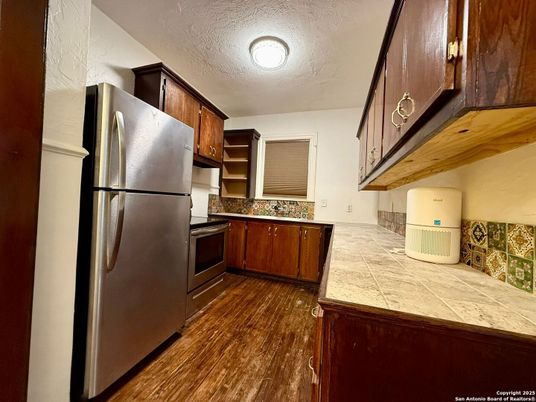 Interior, Kitchen, Tile Countertops, Wood Texture Flooring