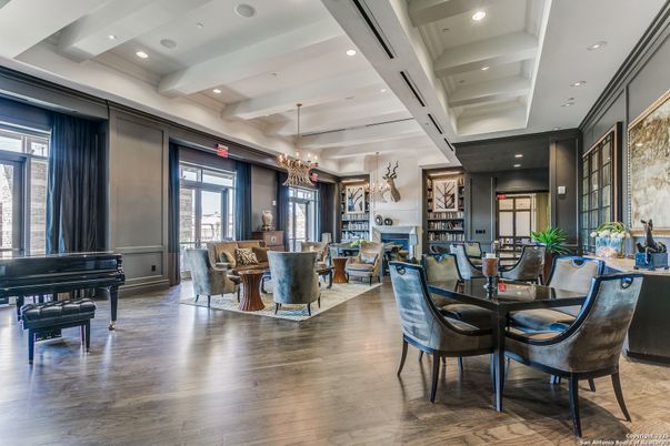Chandelier, Dining room, Fireplace, Interior, Living room, Piano, Recessed Lighting, Wood Texture Flooring