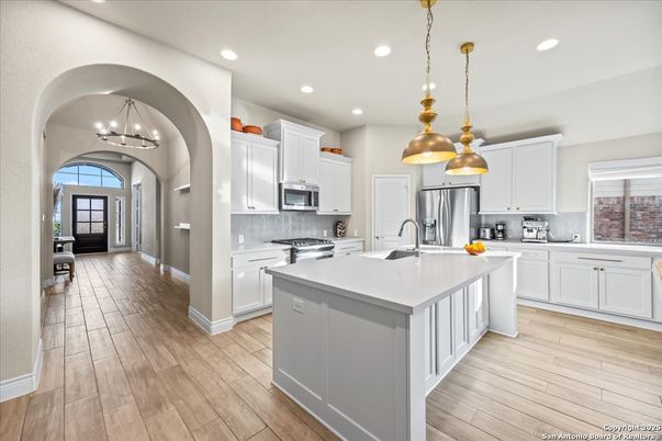 Interior, Kitchen, Pendant Lights, Recessed Lighting, Stainless Steel Appliances, Wood Texture Flooring