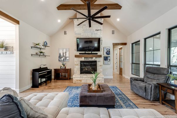 Fireplace, Interior, Living room, Recessed Lighting, Stone Walls, Wooden Beams, Wood Texture Flooring