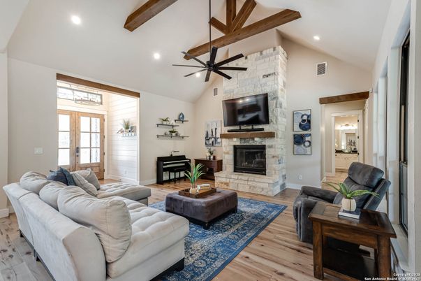 Fireplace, Interior, Living room, Recessed Lighting, Stone Walls, Wooden Beams, Wood Texture Flooring