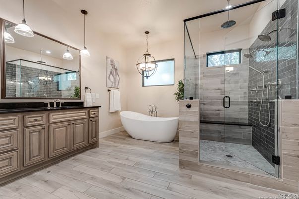 Bathroom, Dual Sink Vanities, Free Standing Baths, Glass Shower, Interior, Pendant Lights, Wood Texture Flooring