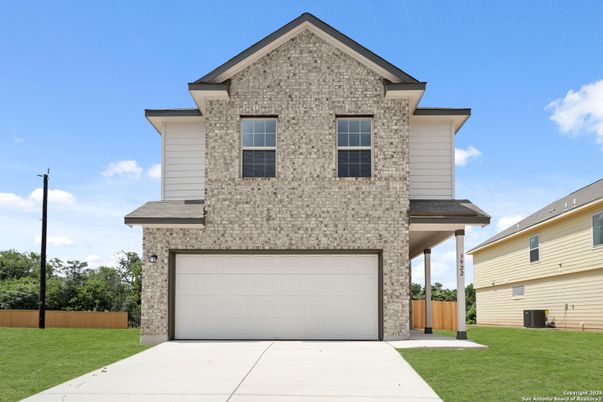 Attached, Exterior, Facade, Brick Traditional