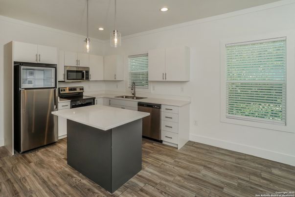 Interior, Kitchen, Pendant Lights, Recessed Lighting, Stainless Steel Appliances, Wood Texture Flooring