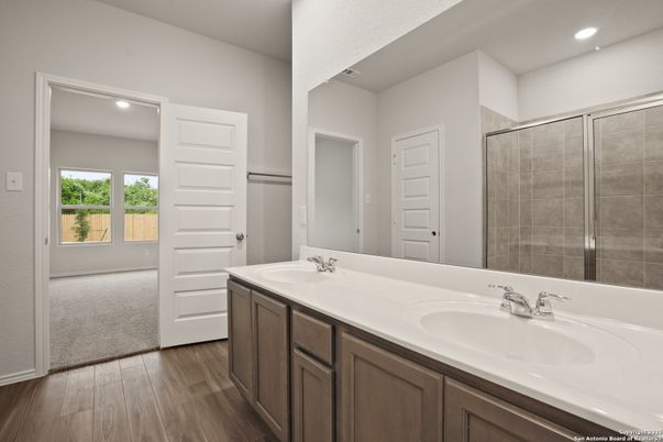 Bathroom, Dual Sink Vanities, Interior, Recessed Lighting, Wood Texture Flooring