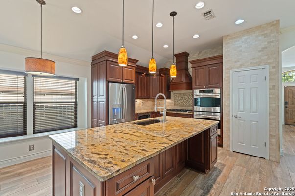 Interior, Kitchen, Pendant Lights, Recessed Lighting, Stainless Steel Appliances, Wood Texture Flooring