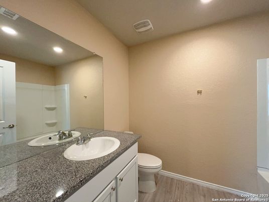 Bathroom, Dual Sink Vanities, Interior, Recessed Lighting, Wood Texture Flooring