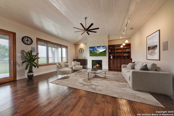 Fireplace, Interior, Living room, Pendant Lights, Stone Walls, Wood Texture Flooring