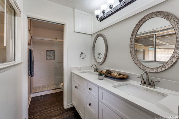 Bathroom, Dual Sink Vanities, Glass Shower, Interior, Wood Texture Flooring