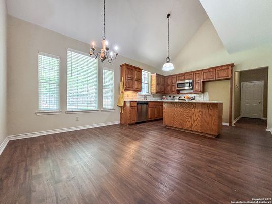 Chandelier, Interior, Kitchen, Pendant Lights, Stainless Steel Appliances, Wood Texture Flooring