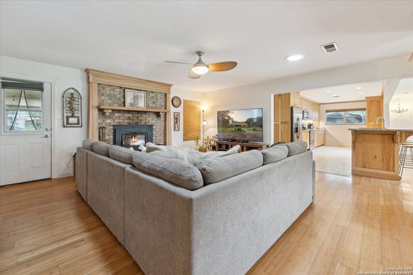 Fireplace, Interior, Kitchen, Living room, Recessed Lighting, Wood Texture Flooring