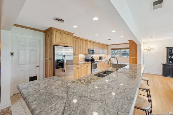 Chandelier, Interior, Kitchen, Recessed Lighting, Stainless Steel Appliances, Wood Texture Flooring