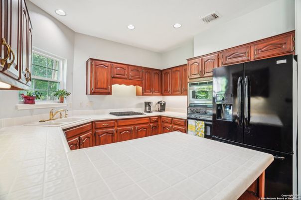Interior, Kitchen, Recessed Lighting, Tile Countertops