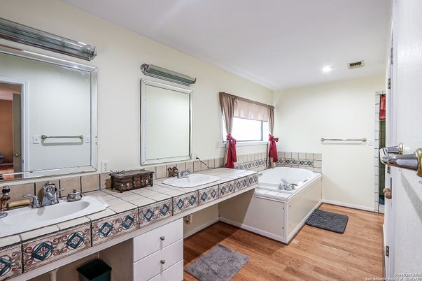 Bathroom, Dual Sink Vanities, Interior, Recessed Lighting, Tile Countertops, Wood Texture Flooring
