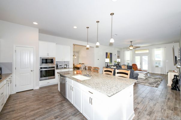 Dining room, Interior, Kitchen, Living room, Pendant Lights, Recessed Lighting, Stainless Steel Appliances, Wood Texture Flooring