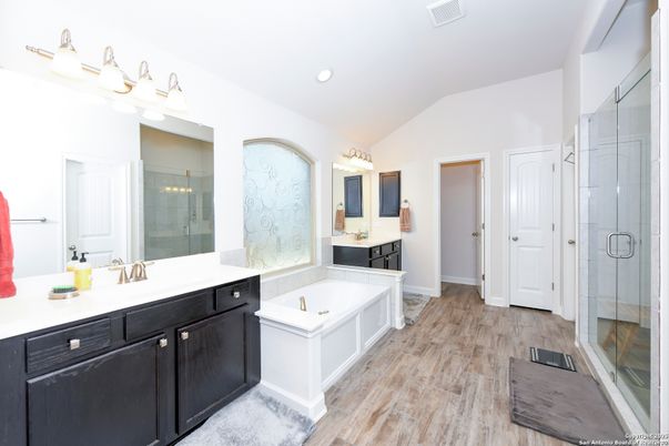 Bathroom, Dual Sink Vanities, Glass Shower, Interior, Recessed Lighting, Wood Texture Flooring