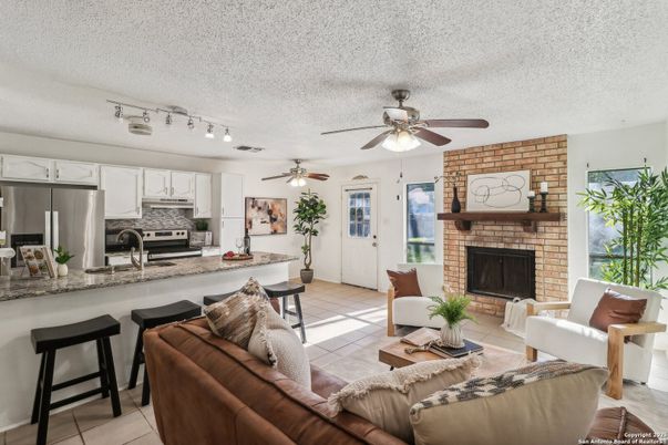 Fireplace, Interior, Kitchen, Living room, Stainless Steel Appliances, Stone Walls