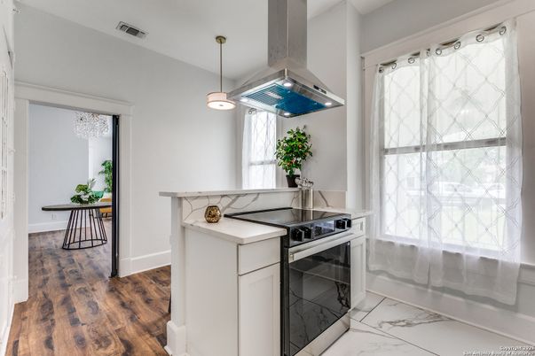 Interior, Kitchen, Marble, Pendant Lights, Stainless Steel Appliances, Wood Texture Flooring