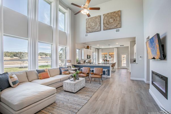 Fireplace, Interior, Kitchen, Living room, Recessed Lighting, Water, Wood Texture Flooring