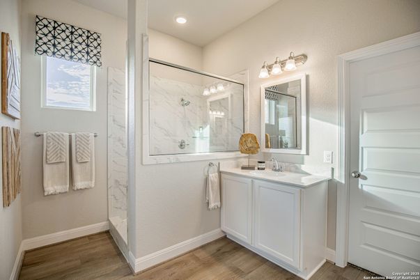 Bathroom, Glass Shower, Interior, Marble Walls, Recessed Lighting, Wood Texture Flooring