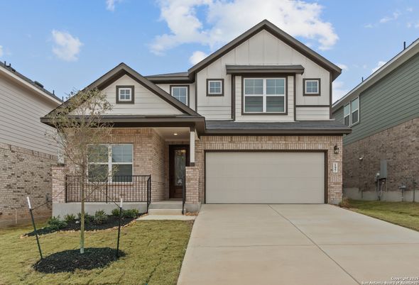 Attached, Exterior, Facade, Brick Facade, American Craftsman
