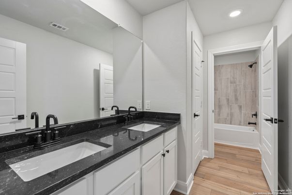 Bathroom, Dual Sink Vanities, Interior, Recessed Lighting, Wood Texture Flooring