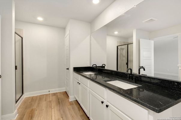 Bathroom, Dual Sink Vanities, Interior, Recessed Lighting, Wood Texture Flooring