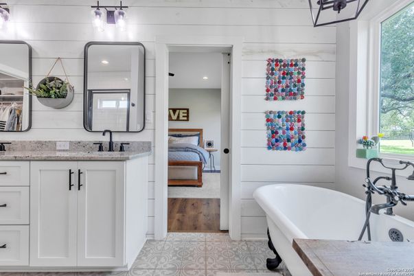 Bathroom, Dual Sink Vanities, Free Standing Baths, Interior, Recessed Lighting, Wood Texture Flooring