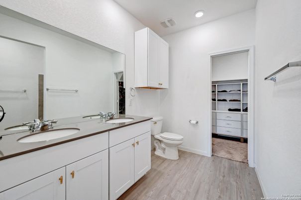 Bathroom, Dual Sink Vanities, Interior, Recessed Lighting, Wood Texture Flooring
