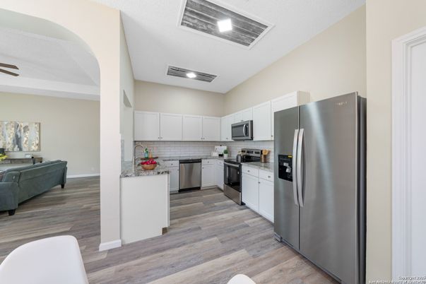 Interior, Kitchen, Recessed Lighting, Stainless Steel Appliances, Wood Texture Flooring