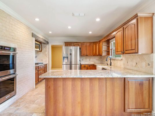 Interior, Kitchen, Recessed Lighting, Stainless Steel Appliances, Stone Walls