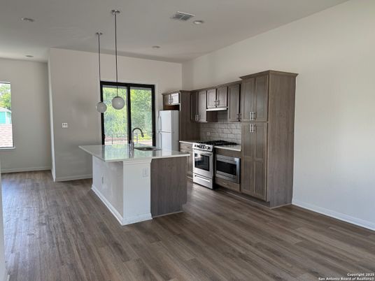 Interior, Kitchen, Pendant Lights, Recessed Lighting, Stainless Steel Appliances, Wood Texture Flooring