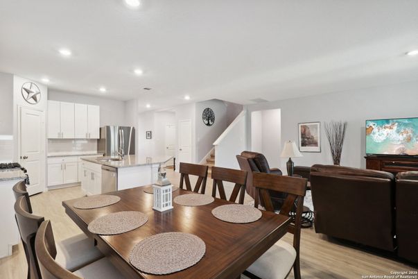 Dining room, Interior, Kitchen, Living room, Recessed Lighting, Stainless Steel Appliances, Wood Texture Flooring