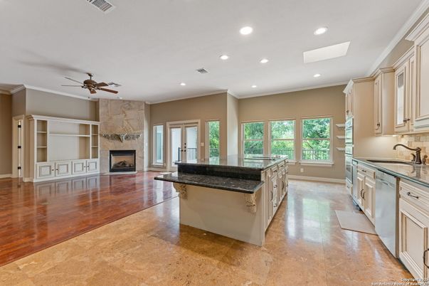 Fireplace, Interior, Kitchen, Recessed Lighting, Wood Texture Flooring