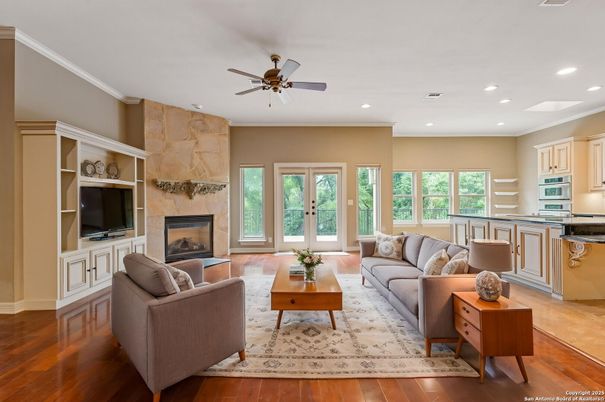 Fireplace, Interior, Kitchen, Living room, Recessed Lighting, Stone Walls, Wood Texture Flooring