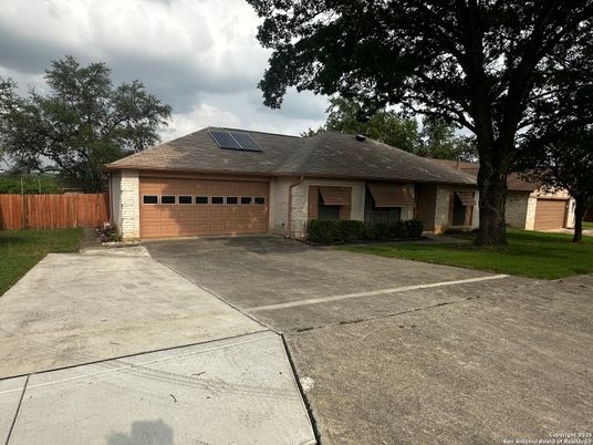Attached, Exterior, Facade, Brick Facade, Solar Panels, Ranch