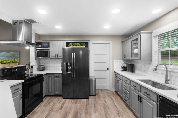 Interior, Kitchen, Recessed Lighting, Stainless Steel Appliances, Wood Texture Flooring