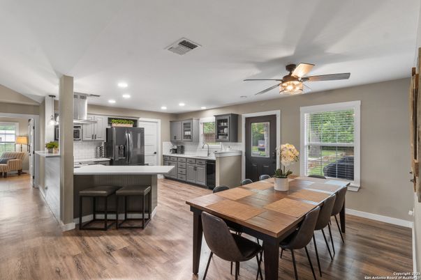 Dining room, Interior, Kitchen, Recessed Lighting, Stainless Steel Appliances, Wood Texture Flooring
