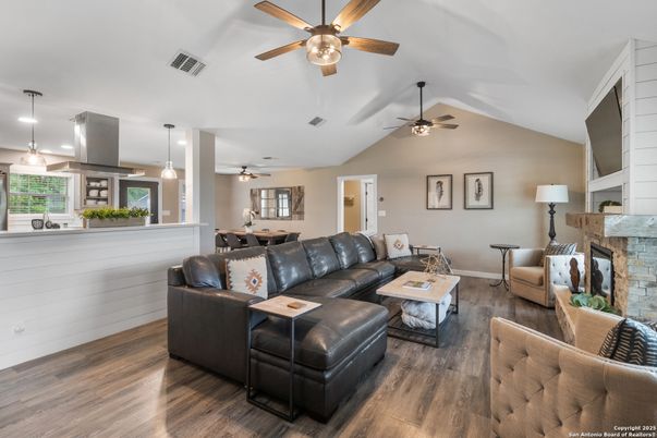 Dining room, Fireplace, Interior, Living room, Pendant Lights, Recessed Lighting, Stone Walls, Wood Texture Flooring