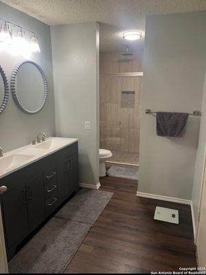 Bathroom, Dual Sink Vanities, Glass Shower, Interior, Wood Texture Flooring