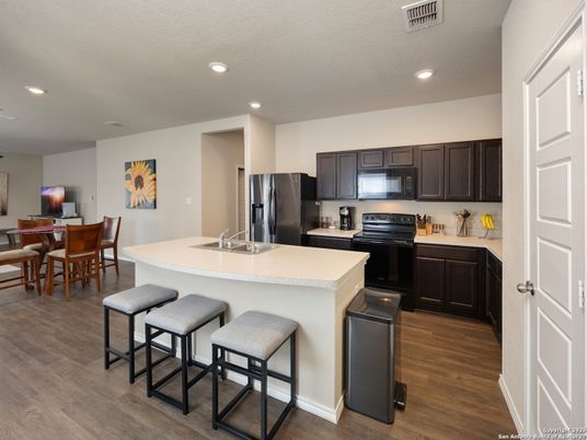 Dining room, Interior, Kitchen, Recessed Lighting, Stainless Steel Appliances, Wood Texture Flooring