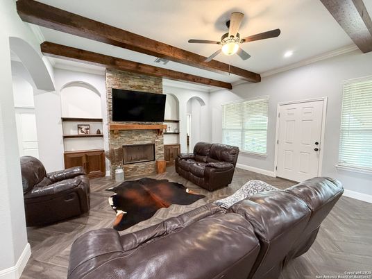 Fireplace, Interior, Living room, Recessed Lighting, Stone Walls, Wooden Beams, Wood Texture Flooring