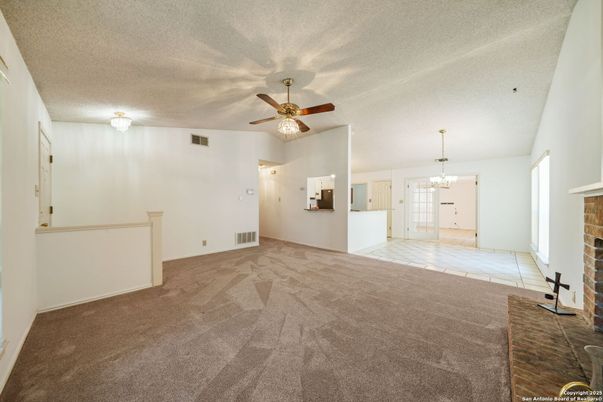 Chandelier, Empty room, Fireplace, Interior
