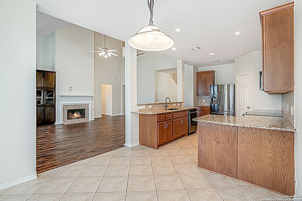 Fireplace, Interior, Kitchen, Pendant Lights, Recessed Lighting, Wood Texture Flooring