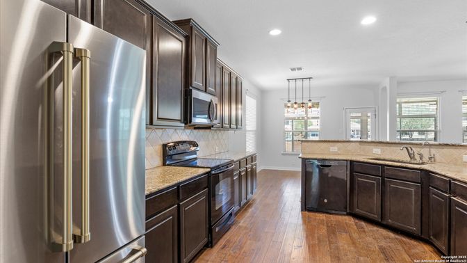 Interior, Kitchen, Pendant Lights, Recessed Lighting, Stainless Steel Appliances, Wood Texture Flooring